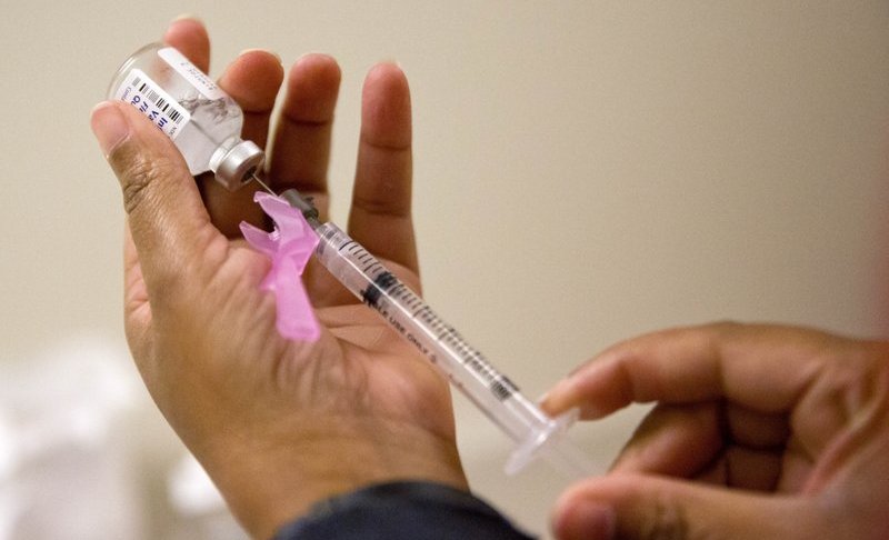 Flu season vaccination. Photo via AP.