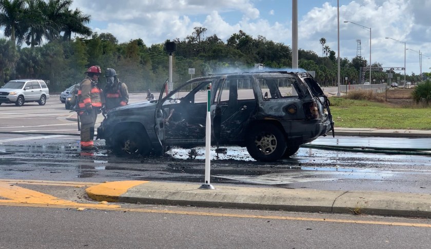 Vehicle erupts in flames, shutdowns traffic. Photo via WINK News.