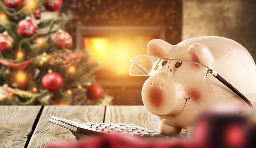 Keeping the holiday joyous and less stressful means keeping a firm rein on our spending. Photo via CBS Money.