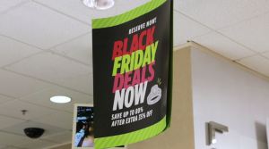 Sign advertising upcoming Black Friday sales. Photo via WINK News.