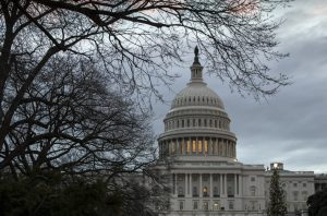 FILE:The Capitol is seen on the first morning of a partial government shutdown, as Democratic and Republican lawmakers are at a standoff with President Donald Trump on spending for his border wall, in Washington, Saturday, Dec. 22, 2018. (AP Photo/J. Scott Applewhite/FILE)