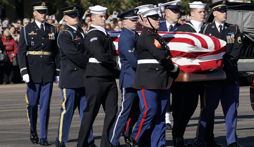 With the flag-draped casket of former President George H.W. Bush aboard at Ellington Field, Special Air Mission 41 prepares to depart, Monday, Dec. 3, 2018, in Houston. (AP Photo/Eric Gay) (AP Photo/Eric Gay)