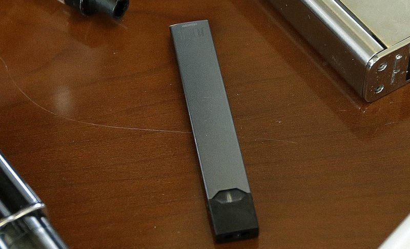 This April 10, 2018, file photo shows a Juul in Marshfield, Mass. AP Photo/Steven Senne, File.