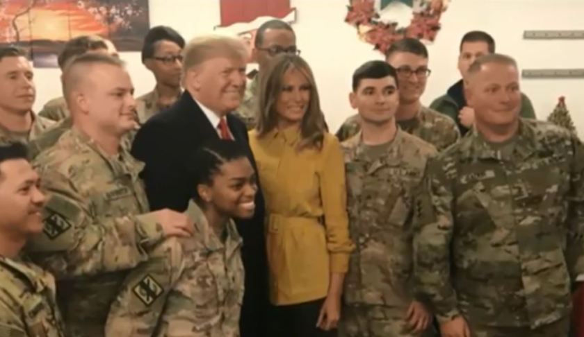 Trump visits troops in Iraq. Photo via CBS News.
