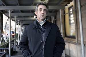 Michael Cohen, former lawyer to President Donald Trump, leaves his apartment building on New York's Park Avenue, Friday, Dec. 7, 2018. (AP Photo/Richard Drew)