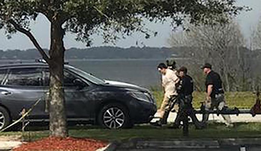Suspect is taken into custody after a SunTrust bank robber that turned into a hostage situation in Sebring Wednesday. CREDIT: Highlands News-Sun Staff