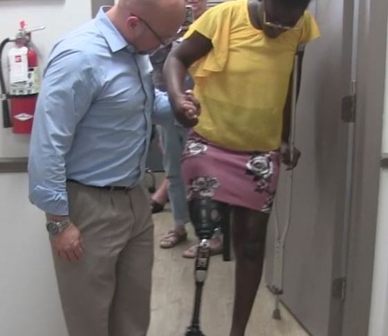 Alia Sainval is able to walk with her prosthetic leg. Photo via WINK News.