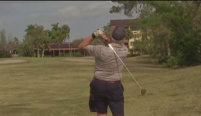 Collier County is in negotiations for the land the nearby homeowner is golfing on. WINK News photo.