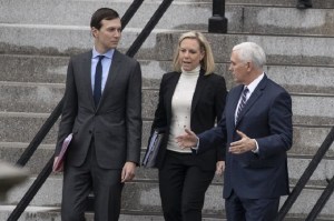 White House Senior Adviser Jared Kushner, left, Homeland Security Secretary Kirstjen Nielsen, and Vice President Mike Pence, talk as they walk down the steps of the Eisenhower Executive Office Building on the White House complex, Saturday, Jan. 5, 2019, in Washington. Photo via AP/Alex Brandon.