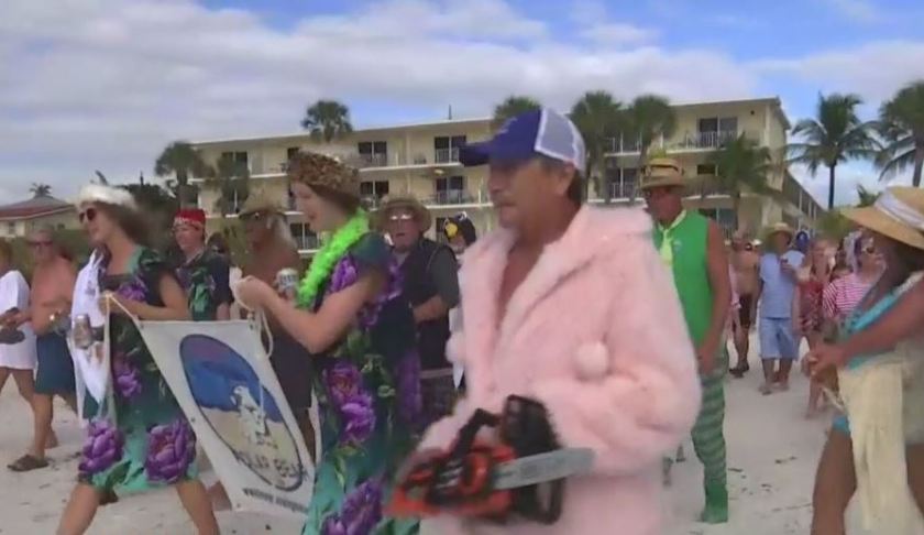 Polar Bear Plunge participants walk to the water. Photo via WINK News.
