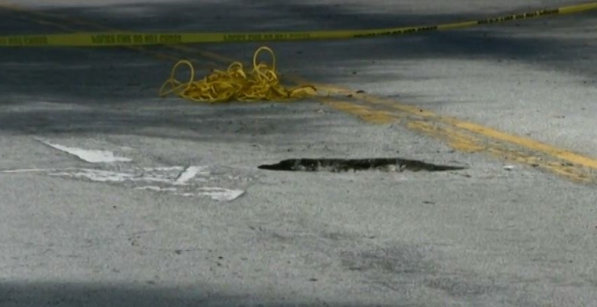 Pot hole where there is a tunnel underneath in Pembroke Pines. (CBS4 photo)