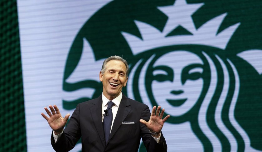 FILE - In this March 22, 2017 file photo, Starbucks CEO Howard Schultz speaks at the Starbucks annual shareholders meeting in Seattle. For someone who has given about $150,000 to Democratic campaigns over the years, Schultz is generating tepid, or even hostile, responses within the party as he weighs a presidential bid in 2020. That's because reports have suggested he's considering running as an independent, a prospect that could draw support away from the eventual Democratic nominee and hand President Donald Trump another four years in office, many fret. (AP Photo/Elaine Thompson, File)