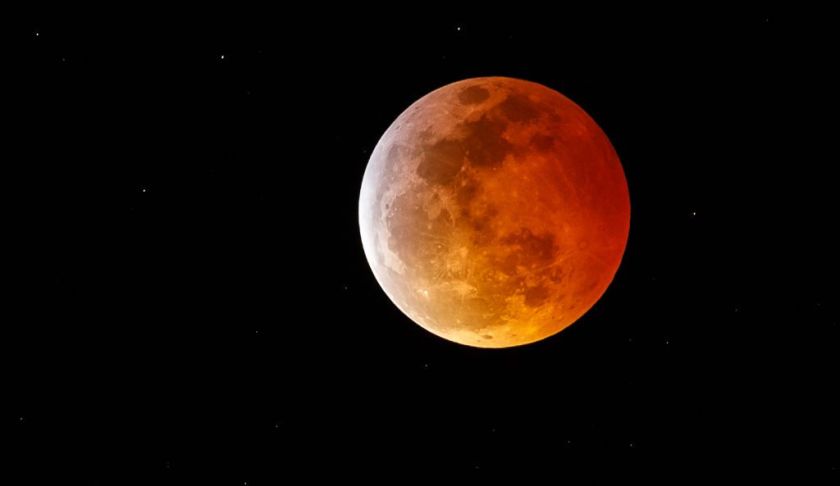 Super blood moon as seen Sunday evening. Photo via CBS News.