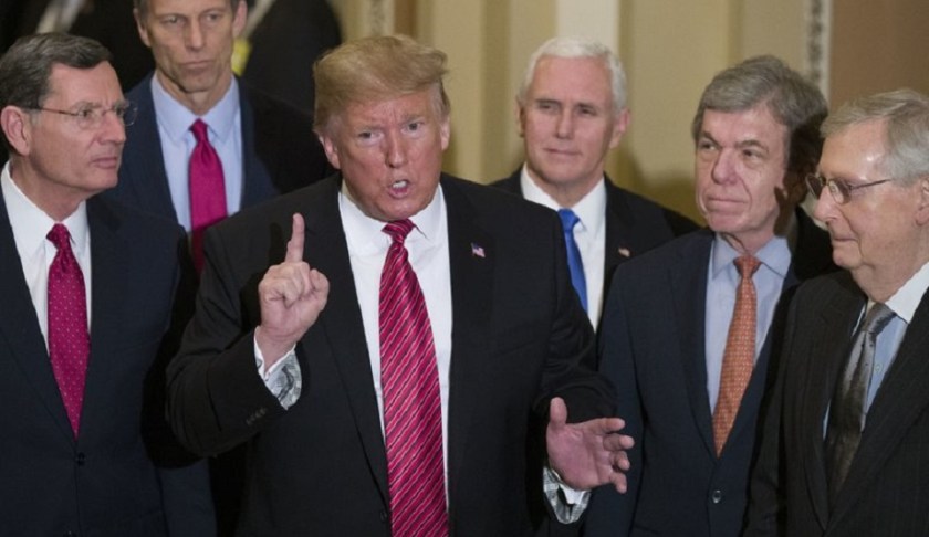 Sen. John Barrasso, R-Wyo., left, and Sen. John Thune, R-S.D., stand with President Donald Trump, Vice President Mike Pence, Sen. Roy Blunt, R-Mo., and Senate Majority Leader Mitch McConnell of Ky., as Trump speaks while departing after a Senate Republican Policy luncheon, on Capitol Hill in Washington, Wednesday, Jan. 9, 2019. Photo via AP/Alex Brandon.