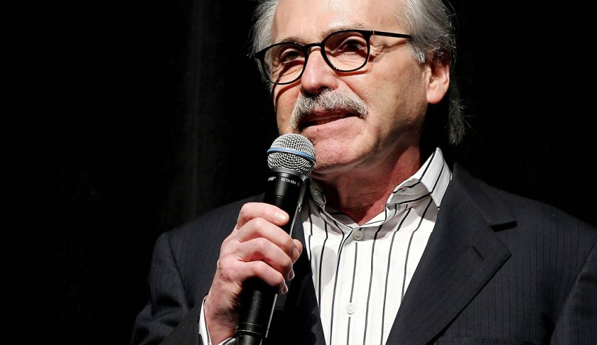 FILE - In this Jan. 31, 2014 photo, David Pecker, Chairman and CEO of American Media, addresses those attending the Shape & Men's Fitness Super Bowl Party in New York. An attorney for the head of the National Enquirer’s parent company says the tabloid didn’t commit extortion or blackmail by threatening to publish Amazon CEO Jeff Bezos’ explicit photos. Elkan Abramowitz represents American Media Inc. CEO David Pecker. He defended the tabloid’s practice as a “negotiation” in an interview Sunday, Feb. 10, 2019, with ABC News. (Marion Curtis via AP, File)