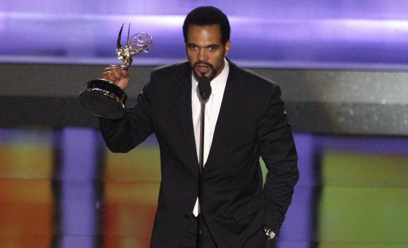 FILE- In this June 20, 2008, file photo Kristoff St. John accepts the award for outstanding supporting actor in a drama series for his work on "The Young and the Restless" at the 35th Annual Daytime Emmy Awards in Los Angeles. John has died at age 52. Los Angeles police were called to John's home on Sunday, Feb. 3, 2019, and his body was turned over to the Los Angeles County coroner. The cause of death was not available. (AP Photo/Matt Sayles, File)