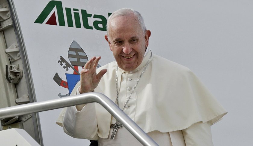 Pope Francis waves as he boards the airplane for Abu Dhabi, United Arab Emirates, at Rome's Fiumicino International airport, Sunday, Feb. 3, 2019. Francis made an urgent appeal for an end to the humanitarian crisis in Yemen on Sunday as he embarked on the first-ever papal trip to the Arabian Peninsula, where he is seeking to turn a page in Christian-Muslim relations while also ministering to a unique, thriving island of Catholicism. (AP Photo/Gregorio Borgia)