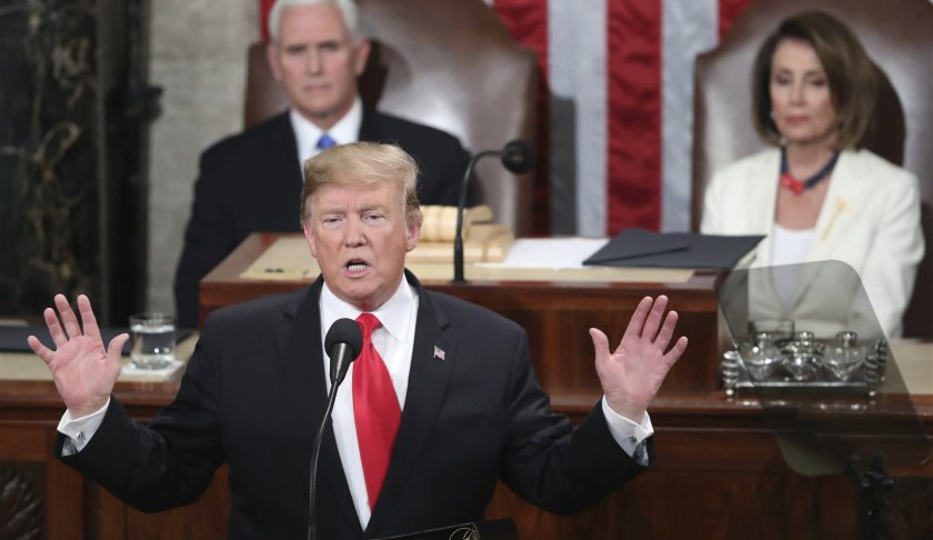 President Donald Trump delivers his State of the Union address to a joint session of Congress on Capitol Hill in Washington, as Vice President Mike Pence and Speaker of the House Nancy Pelosi, D-Calif., watch, Tuesday, Feb. 5, 2019. (AP Photo/Andrew Harnik)