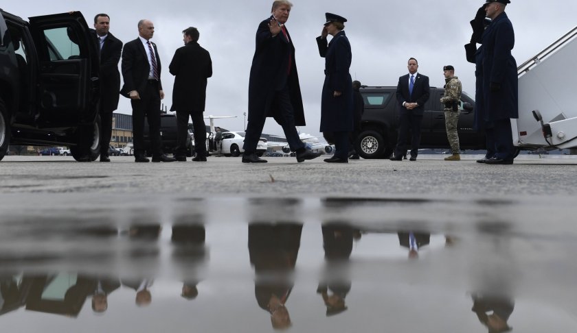 President Donald Trump waves as he arrives to board Air Force One at Andrews Air Force Base in Md., Monday, Feb. 11, 2019. Trump is heading to El Paso, Texas, to try and turn the debate over a wall at the U.S.-Mexico border back to his political advantage as his signature pledge to American voters threatens to become a model of unfulfilled promises. (AP Photo/Susan Walsh)