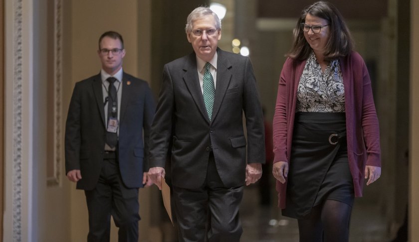 Senate Majority Leader Mitch McConnell, R-Ky., walks to the chamber on the morning after House and Senate negotiators worked out a border security compromise hoping to avoid another government shutdown, at the Capitol in in Washington, Tuesday, Feb. 12, 2019. (AP Photo/J. Scott Applewhite)