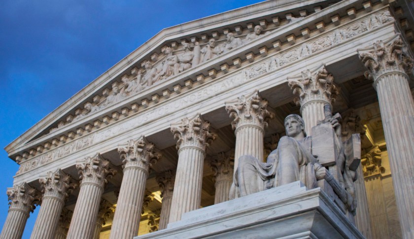 FILE - In this Feb. 13, 2016 file photo, the Supreme Court building at sunset in Washington. (AP Photo/Jon Elswick, File)