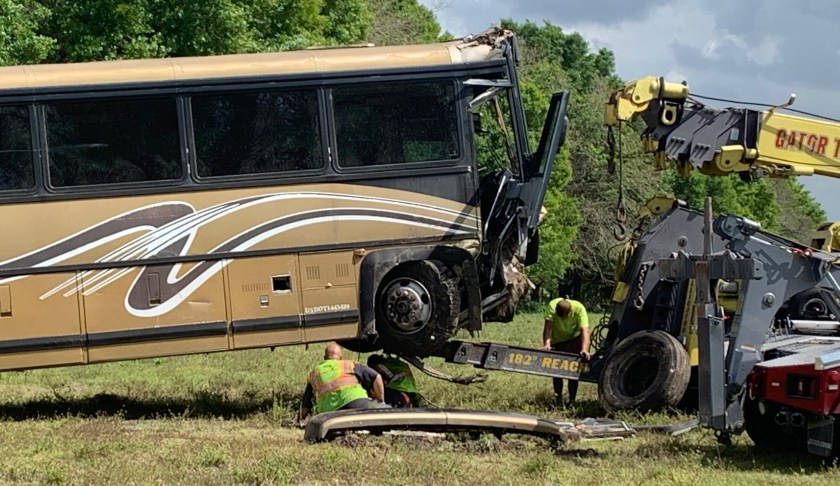 Towing the bus in process. (WINK News photo)