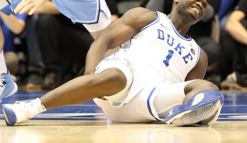 Zion Williamson , Duke Blue Devils star, moments after his basketball shoe ripped apart. (CBS News photo)