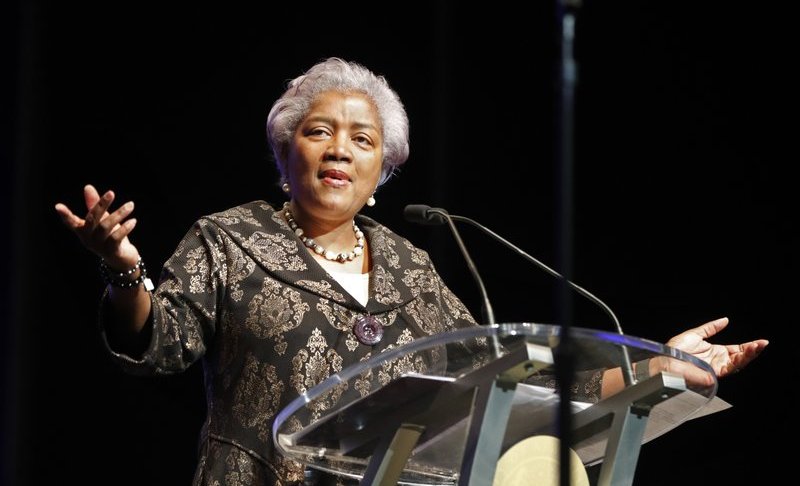 FILE - This May 7, 2018 file photo shows Donna Brazile speaking at the inauguration of New Orleans Mayor Latoya Cantrell in New Orleans. Fox News says it has hired former Democratic National Committee chief Brazile as a political commentator. She had been let go from a similar role at CNN in 2016 after it was revealed that she had shared material about topics that would be addressed at a Democratic forum with Hillary Clinton’s campaign. (AP Photo/Gerald Herbert, File)