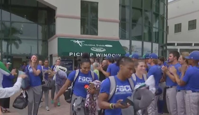 FGCU women's basketball team boards the bus to its first round game against the University of Miami in Coral Gables Friday evening. (Credit: WINK News)
