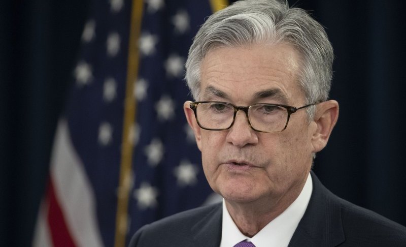 FILE - In this Jan. 30, 2019, file photo, Federal Reserve Chairman Jerome Powell speaks at a news conference in Washington. Powell says political attacks by President Donald Trump played no role in the Fed’s decision in January to signal that it planned to take a pause in hiking interest rates. He also said in an interview broadcast Sunday, March 10, 2019, that he can’t be fired by the president and that he intends to serve out his full four-year term. (AP Photo/Alex Brandon, File)