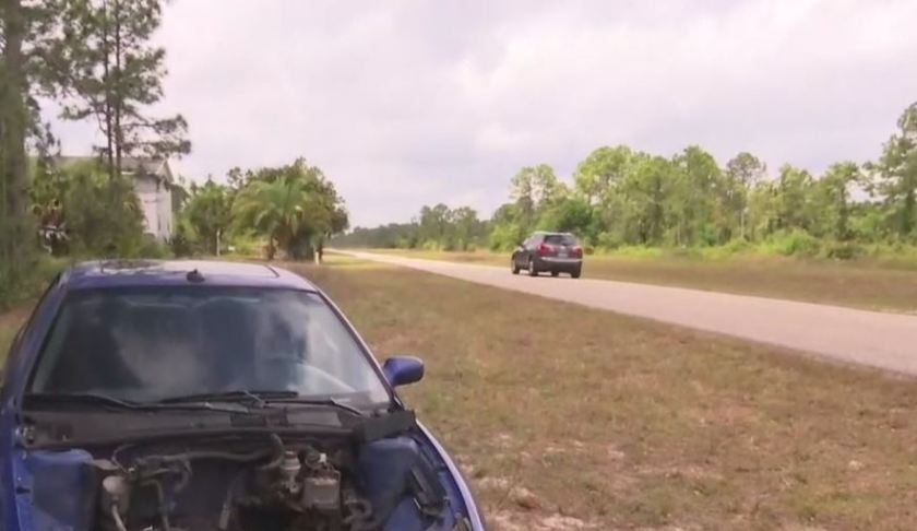 Gutted car lays abandoned in Lehigh Acres. (Credit: WINK News)