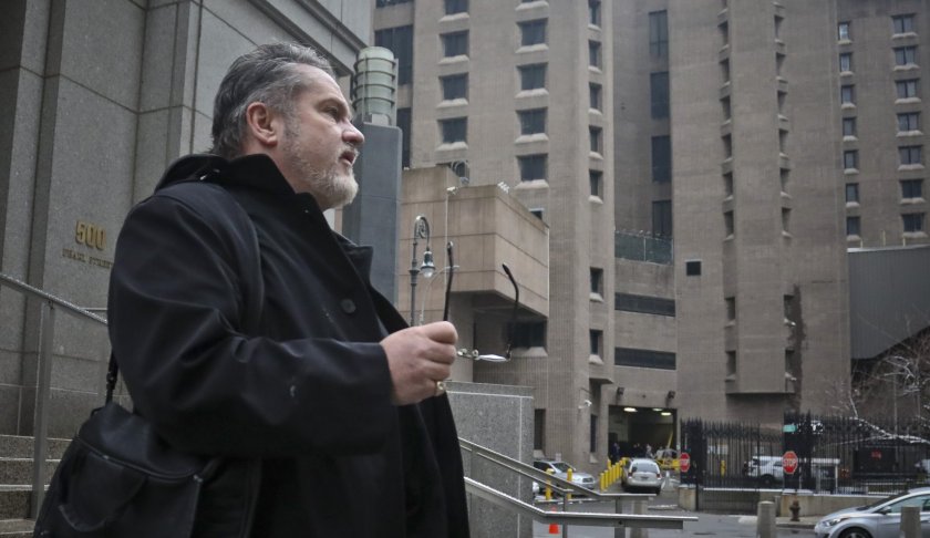 Jack Donson, president of New York-based My Federal Prison Consultant and a retired federal Bureau of Prisons employee, outside federal court and Manhattan Correctional Center, right, where he's consulted with inmate clients, Friday March 1, 2019, in New York. Donson welcomes recent criminal indictments exposing shady dealings in the largely unregulated industry of "prison consultants." (AP Photo/Bebeto Matthews)