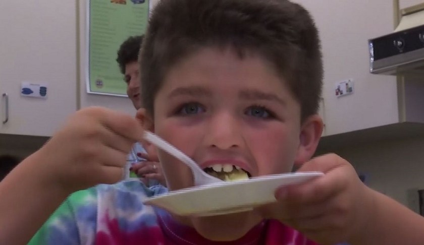 Kid enjoying the food from the pantry. (Credit: WINK News)