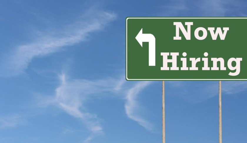 Sign for hiring of new workers. (Credit CBS News)