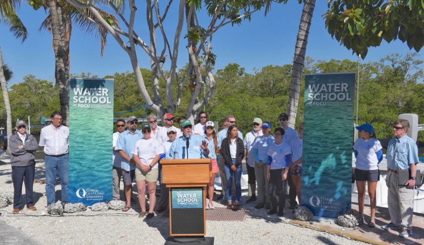President Mike Martin, surrounded by Florida Gulf Coast University faculty and students, announces the founding of The Water School during a ceremony at FGCU’s Vester Field Station in Bonita Springs on Friday, March 22, 2019. (Credit: WINK News)