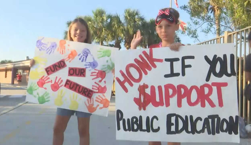 Children advocate for more public education funds during the Collier County 'walk-in'. (Credit: WINK News)