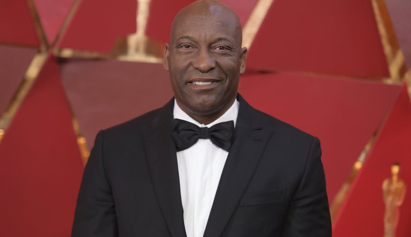 FILE - This March 4, 2018 file photo shows John Singleton at the Oscars in Los Angeles. Oscar-nominated filmmaker John Singleton has died at 51, according to statement from his family, Monday, April 29, 2019. He died Monday after suffering a stroke almost two weeks ago. (Photo by Richard Shotwell/Invision/AP, File)