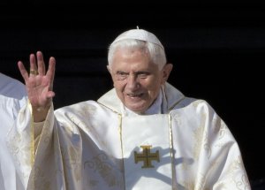 FILE - This Oct. 19, 2014 file photo shows Pope Emeritus Benedict XVI arrives in St. Peter's Square at the Vatican to attend the beatification ceremony of Pope Paul VI, and a mass for the closing of a two-week synod on family issues, celebrated by Pope Francis. Retired Pope Benedict XVI has published an analysis of the origins of the clergy sex abuse scandal, blaming it on the sexual revolution of the 1960s and church laws that protected priests in a rare commentary, published Thursday April 11, 2019.(AP Photo/Andrew Medichini, FILE)