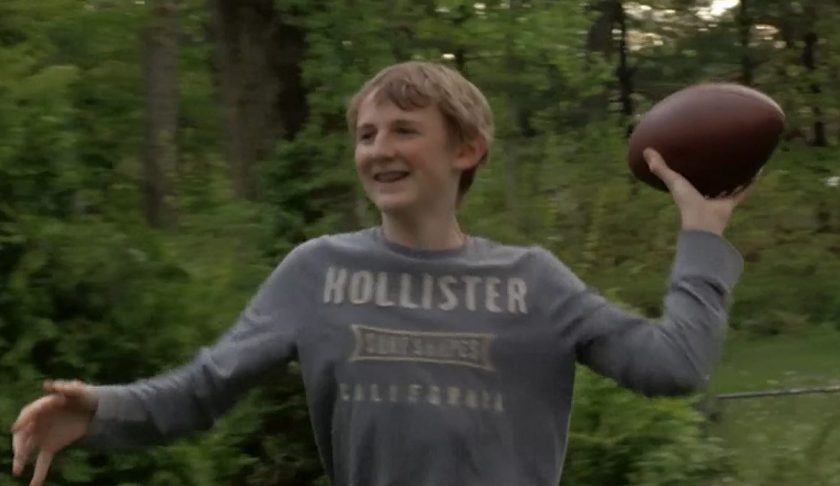 Teen throws a football outside with his sibling. (Credit: Ivanhoe Newswire)