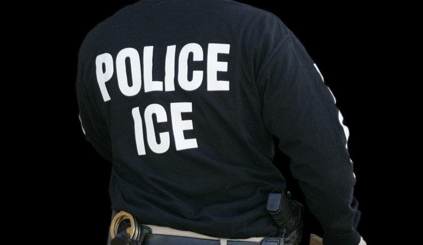 ICE agent. (Credit: AP)