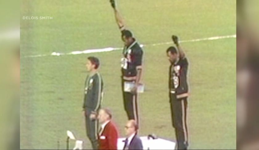 Tommie Smith at the podium. (Credit: Delois Smith)