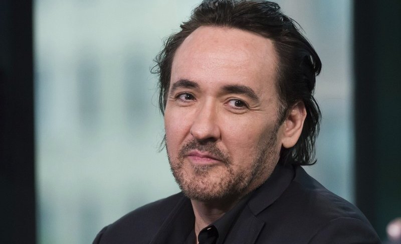 FILE - In this June 4, 2015 file photo, actor John Cusack participates in AOL's BUILD Speaker Series to discuss the film "Love & Mercy" in New York. Cusack has apologized for tweeting an anti-Semitic cartoon and quotation after initially defending the post, then deleting it. (Photo by Charles Sykes/Invision/AP)