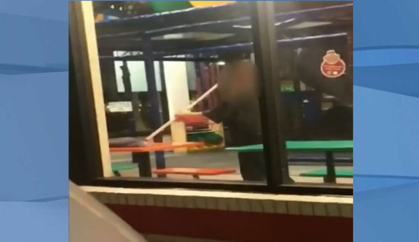 Burger King worker mops up table. (Credit: Katie Duran)