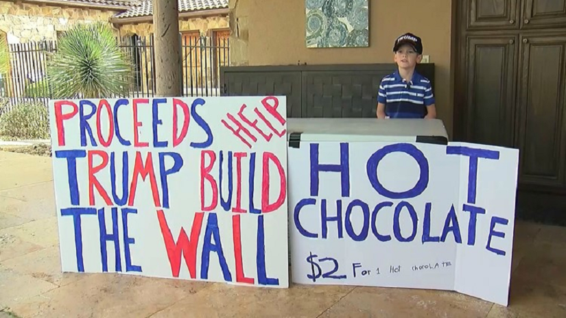 (Benton Stevens collects donations for President Donald Trump's border wall. (Credit: CBS)