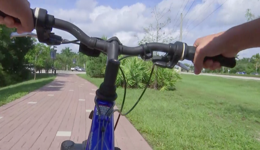 Cyclist rides in Collier County. (Credit: WINK News)