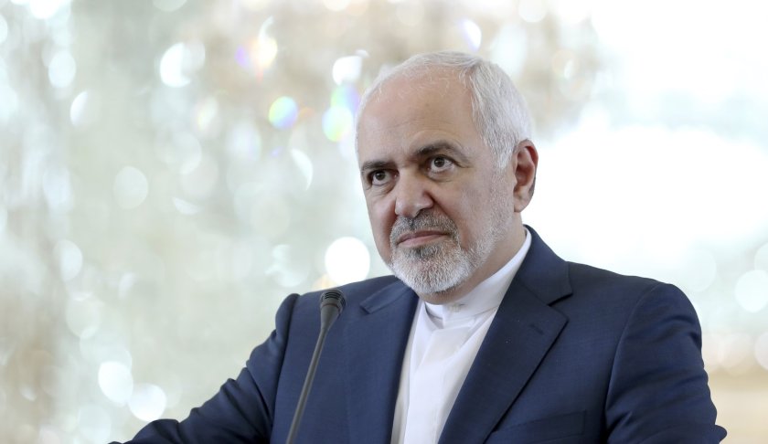 Iranian Foreign Minister Mohammad Javad Zarif speaks during a press conference with his German counterpart Heiko Maas after their talks in Tehran, Iran, Monday, June 10, 2019. Zarif warned the U.S. on Monday that it "cannot expect to stay safe" after launching what he described as an economic war against Tehran, taking a hard-line stance amid a visit by Germany's top diplomat seeking to defuse tensions. (AP Photo/Ebrahim Noroozi)