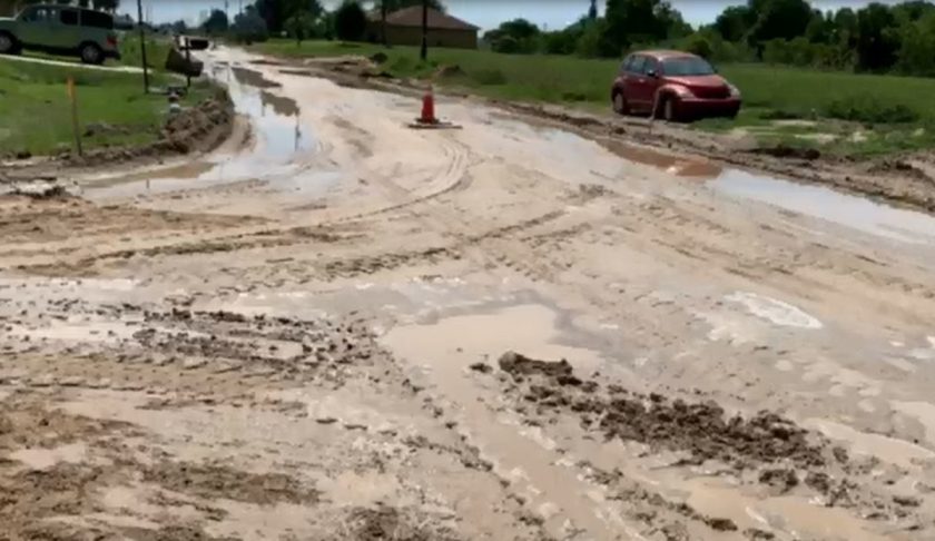 Muddy road leading to problems for some Cape Coral drivers. (Credit: WINK News)