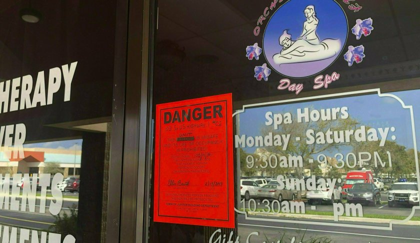 FILE - This Feb. 19, 2019, file photo, shows the Orchids of Asia Day Spa in Jupiter, Fla. The Associated Press has obtained a video that shows detectives trying to persuade a Chinese masseuse to describe herself as a victim of human trafficking. The outcome of her interview would help determine whether Martin County could prove the owners of five massage parlors its deputies raided are not just pimps, but human traffickers holding women against their will. (Hannah Morse/Palm Beach Post via AP, File)