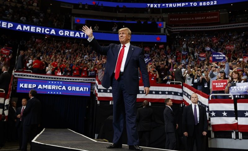 President Donald Trump arrives to speak at his re-election kickoff rally at the Amway Center, Tuesday, June 18, 2019, in Orlando, Fla. (AP Photo/Evan Vucci)