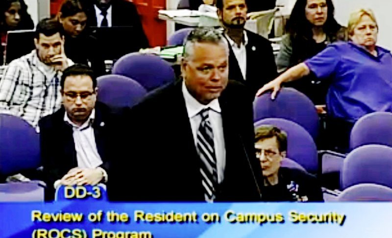 FILE - In this Feb. 18, 2015, file frame from video from Broward County Public Schools, school resource officer Scot Peterson talks during a school board meeting of Broward County, Fla. Peterson, the then-Florida sheriff's deputy assigned to protect the high school where 17 died in a 2018 shooting has been arrested on 11 charges, Tuesday, June 4, 2019. State Attorney Mike Satz announced that 56-year-old Peterson faces child neglect, culpable negligence and perjury charges. (Broward County Public Schools via AP, File)